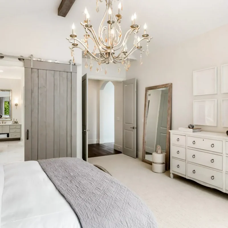 Beautiful master bedroom in new luxury home with view of ensuite bathroom.